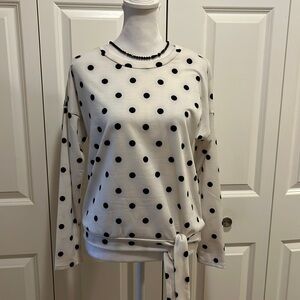 Adorable cream and black polka dot banded bottom top